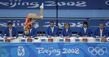 image of How is an Olympic Trampoline Competition Judged?