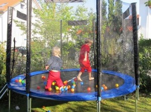 plastic balls on a trampoline 