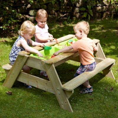 wooden picnic table sandpit